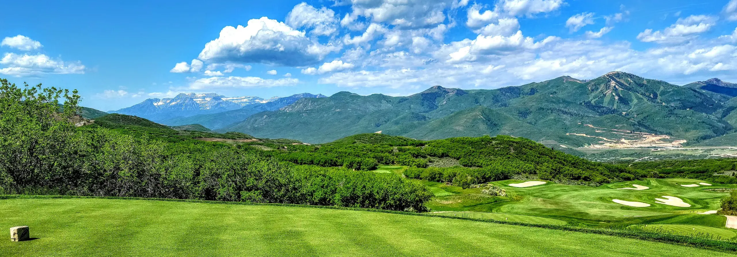 View of Tuhaye golf community with mountain ranges in the background.